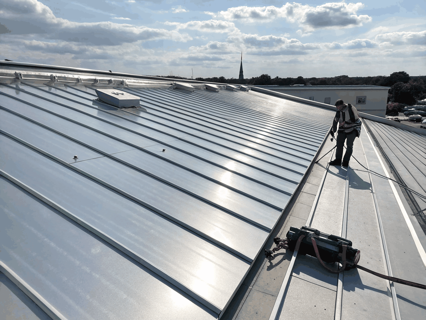 Metal IBR and Clip-Lock roofing installation over steel purlins in the Garden Route